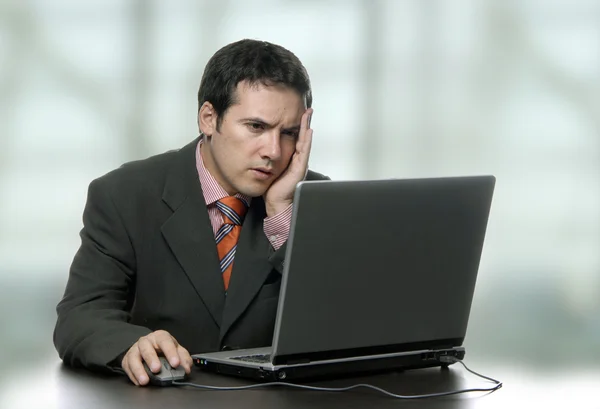 Young man working with his personal computer — Stock Photo, Image