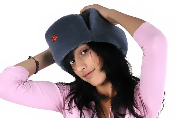 年轻的女孩，与俄罗斯的帽子画像 图库图片