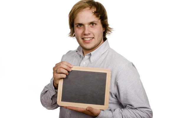 Příležitostné mladík s tabulí — Stock fotografie