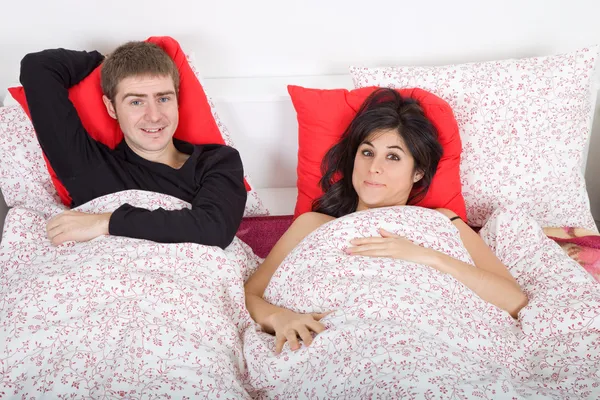 Couple in bed — Stock Photo, Image