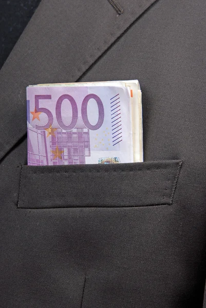 Algunos billetes de banco en bolsillo de hombre de negocios — Foto de Stock