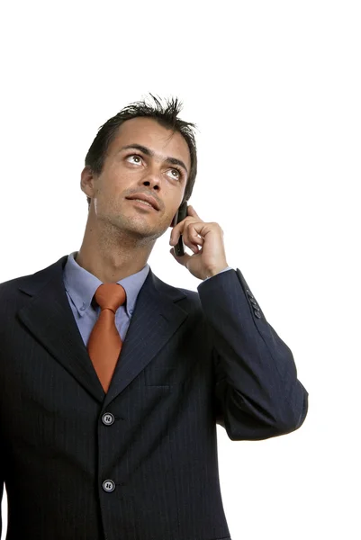 Geschäftsmann am Telefon vor weißem Hintergrund — Stockfoto