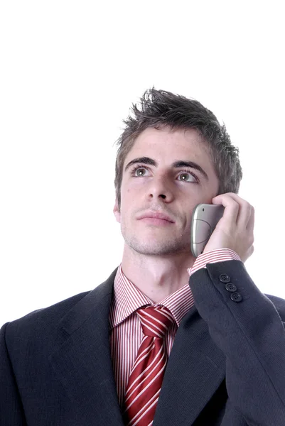 Jovem homem de negócios ao telefone — Fotografia de Stock