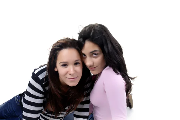 Two young casual girls portrait in studio — Stock Photo, Image