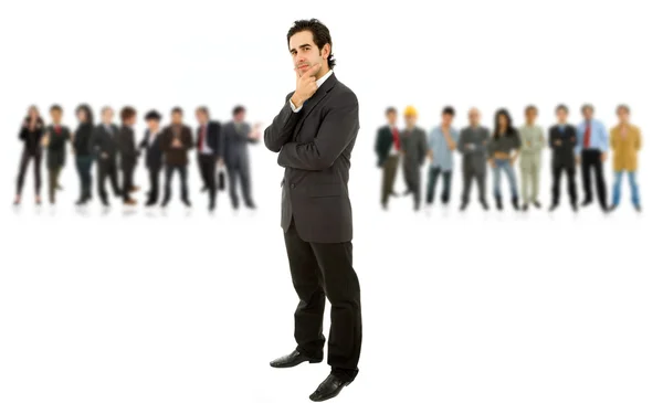 Business man in front of a group of — Stock Photo, Image