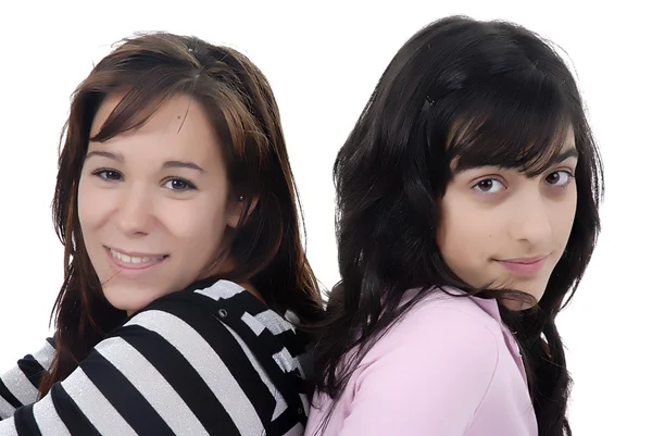 Two young casual girls portrait in studio Royalty Free Stock Photos