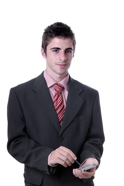 Young business man working with a pda — Stock Photo, Image