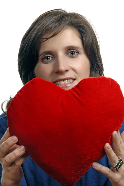 Mooie jonge vrouw met een hart valentines — Stockfoto