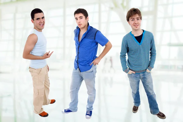 Three young casual men standing — Stock Photo, Image