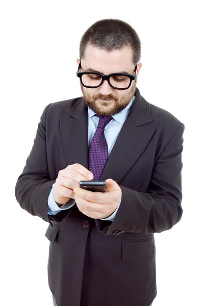 Giovane uomo d'affari guardando al suo telefono — Foto Stock