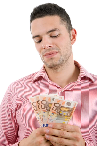 Young casual man with lots of money — Stock Photo, Image