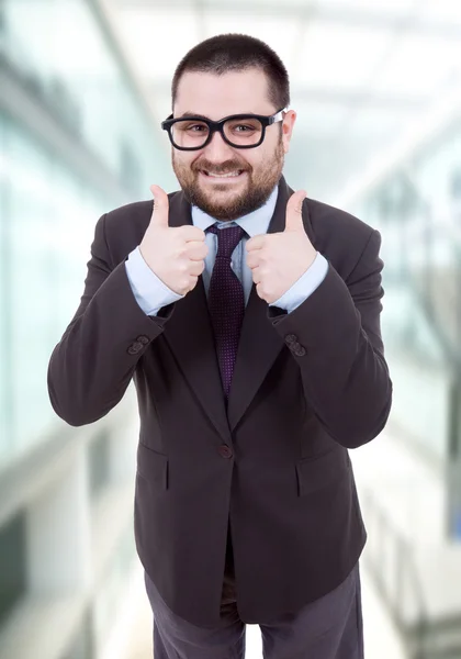 Young silly business man going thumbs up — Stock Photo, Image