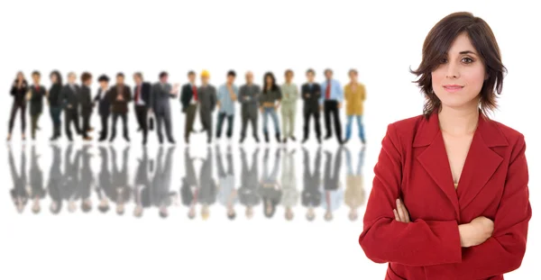 Mujer de negocios frente a un grupo de — Foto de Stock