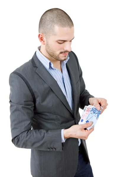 Joven hombre casual con un montón de dinero — Foto de Stock