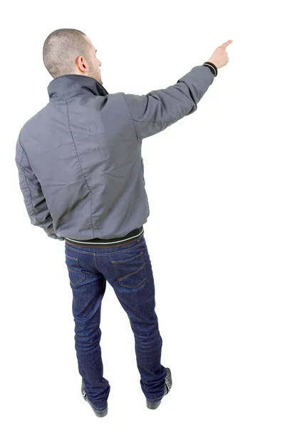 Young casual man pointing — Stock Photo, Image