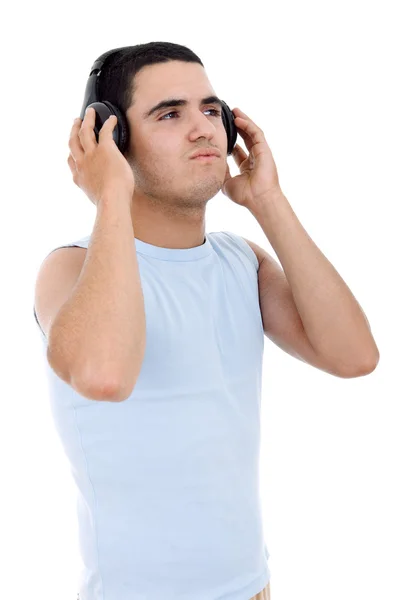 Junger lässiger Mann mit Kopfhörern — Stockfoto