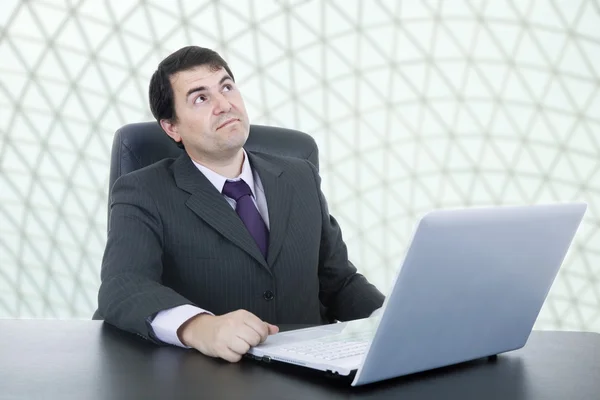 Young business man working with is laptop — Stock Photo, Image