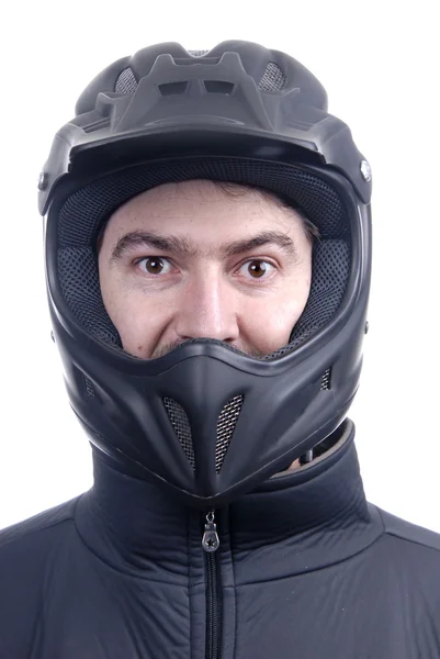 Joven hombre con un casco negro motocicleta —  Fotos de Stock