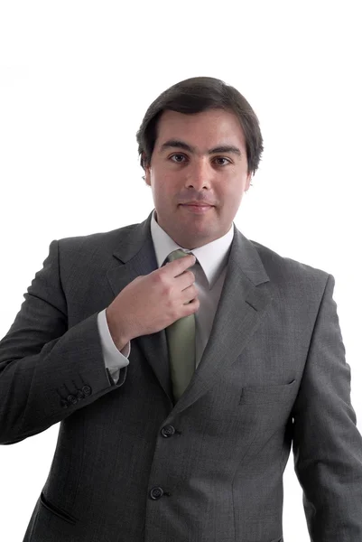 Homem de negócios ajustando sua gravata — Fotografia de Stock