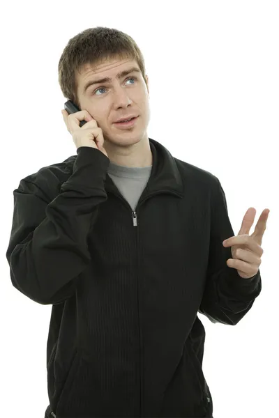 Young casual man on the phone — Stock Photo, Image