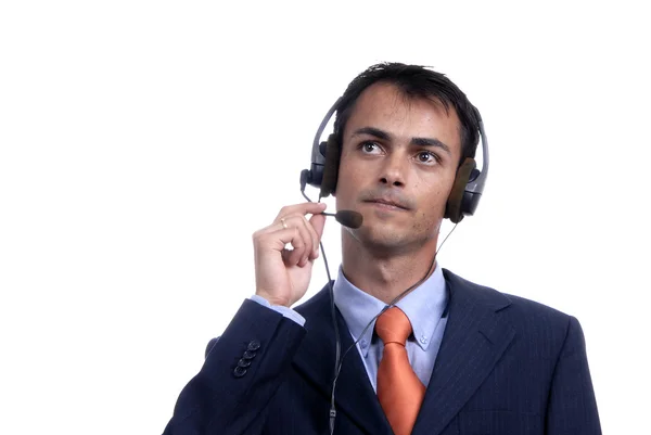Jovem call center homem falando pelo telefone — Fotografia de Stock