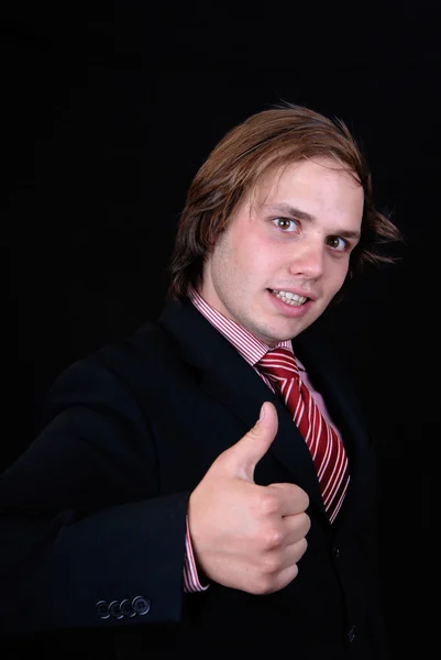 Молодий бізнесмен показує великий палець вгору — стокове фото