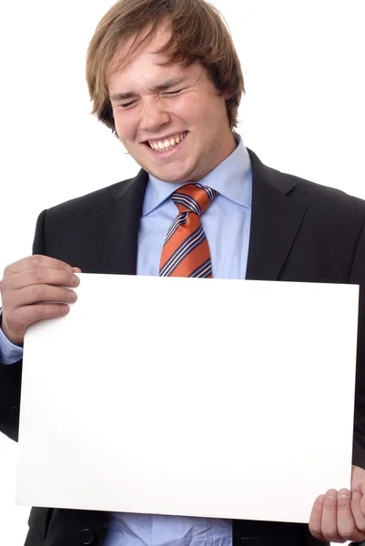 Joven hombre de negocios con una tarjeta vacía — Foto de Stock