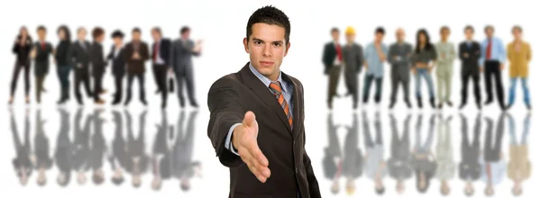 Young business man offering his hand — Stock Photo, Image