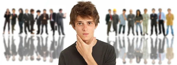 Young man in front of a group of — Stock Photo, Image