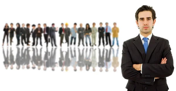 Business man in front of a group of — Stock Photo, Image