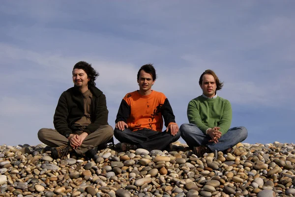 Three casual young men at the beach — Stock Photo, Image