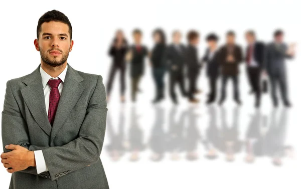 Young business man with some on the back — Stock Photo, Image