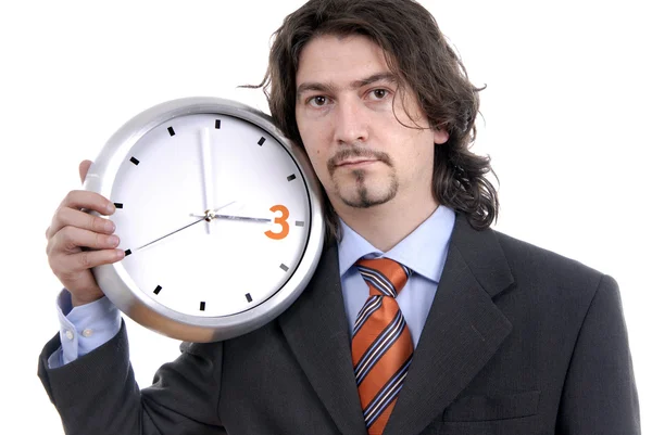 Affärsman med klocka på vit bakgrund — Stockfoto
