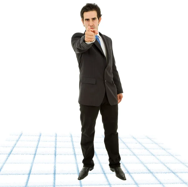 Young business man in a suit pointing with his finger — Stock Photo, Image