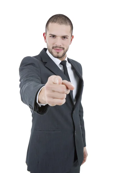 Jeune homme d'affaires en costume pointant du doigt — Photo