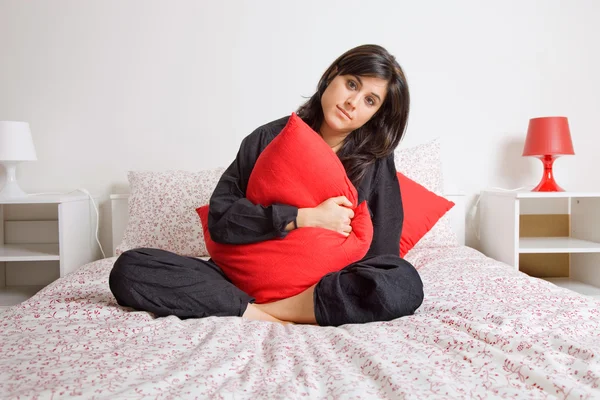 Frau im Bett — Stockfoto