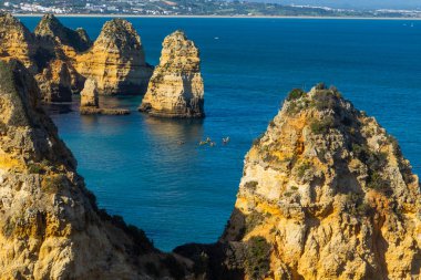 Ponta da Piedade cliffs near Lagos, Portugal. Beautiful seascape with natural rock formations in the Algarve, Portugal