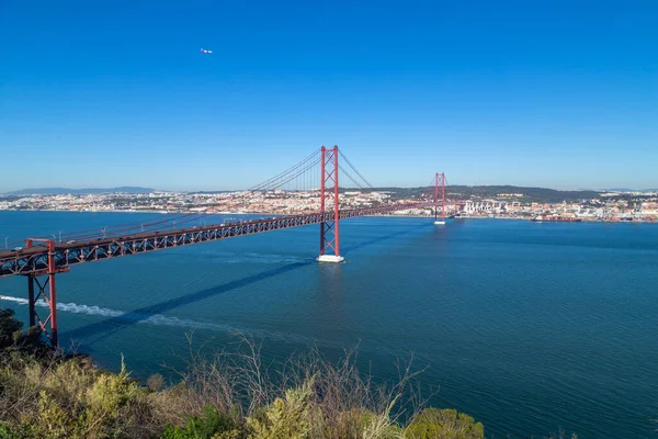 The 25 de Abril Bridge (Ponte 25 de Abril) is a suspension bridge in Lisbon over Tagus river, in Portugal.