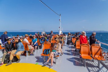 Athens, Greece. People in the ferry boat near Piraeus Port, to travel to Aegean islands for the summer holidays