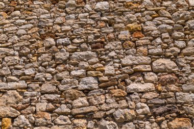 Background of old vintage stone wall. Wall decoration to be beautiful and strong with natural stone.