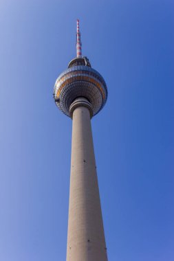 Berlin, Germany. Soaring shaft and silver sphere of Fernsehturm TV tower in Berlin.