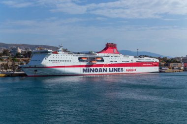 Pireas Greece: Ferry boats cruise ships docking at the port of Piraeus Greece. The port of Piraeus is the largest passenger port in Europe and the third largest in the world.