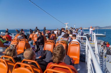 Athens, Greece: People in the ferry boat near Piraeus Port, to travel to Aegean islands for the summer holidays