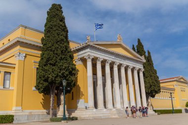 Athens, Greece: People enjoy a sunny afternoon at the courtyard of Zappeion in Athens where meetings and ceremonies are usually held
