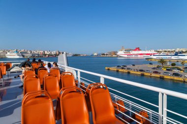 Athens, Greece: People in the ferry boat near Piraeus Port, to travel to Aegean islands for the summer holidays
