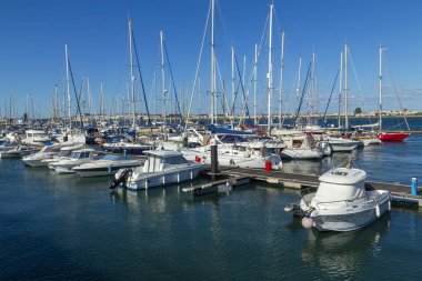 VILA REAL DE SANTO ANTONIO, PORTUGAL - Yachts and boats moored in the marina with waterfront buildings along the Avenida da Republica to the rear, Vila Real de Santo Antonio, Algarve, Portugal