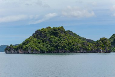 Beautiful island landscape of Halong Bay the UNESCO world heritage site in Vietnam. The bay features thousands of limestone karsts in various shapes and sizes.