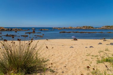 Galicia, Spain: People in Galicia beach in a summer day, Galicia. Spain