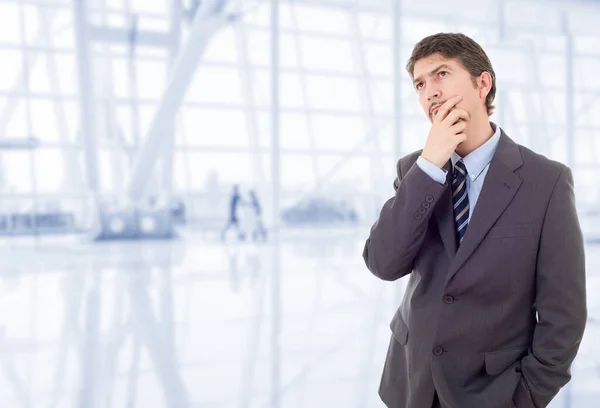 young business man thinking at the office