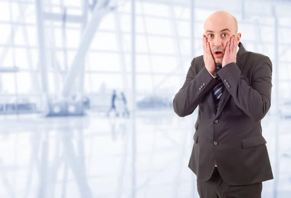 young business man surprised at the office